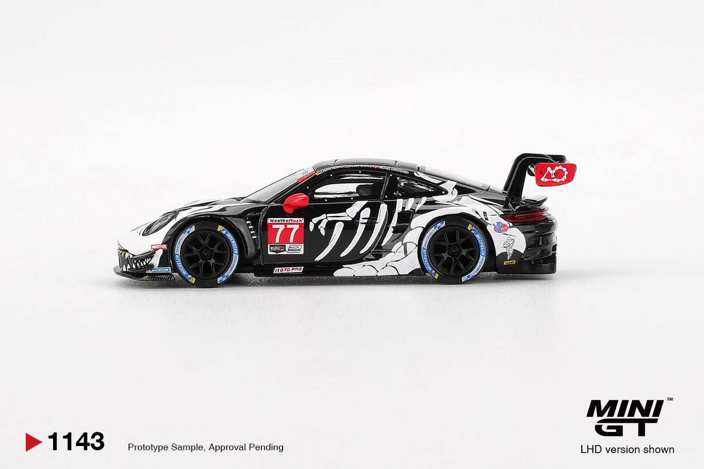 Mini GT #1143 - Porsche 911 GT3 R #77 AO Racing 2025 IMSA Petit Le Mans Skeleton Rexy BLISTER